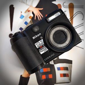 Nikon COOLPIX P5100 12.1MP Magnesium Body Digital Street Photography Camera